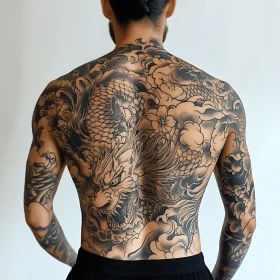 Detailed Back Tattoo of a Dragon in Black Ink