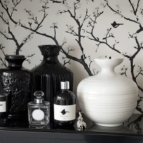 Monochrome Vases Against Floral Wallpaper