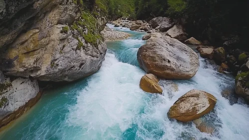 Turquoise River Flowing Between Rocky Cliffs