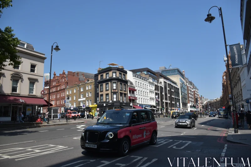 Urban Life in London with Black Cabs Free Stock Photo