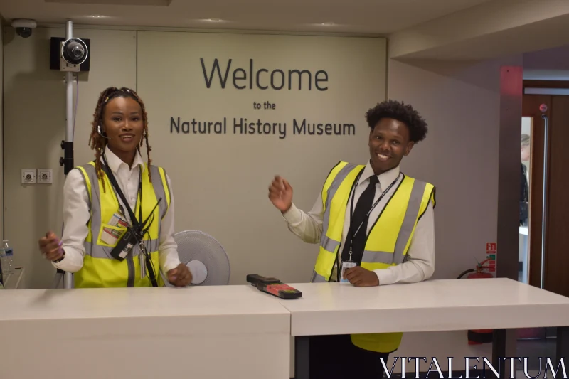 Museum Staff Greeting Visitors Free Stock Photo