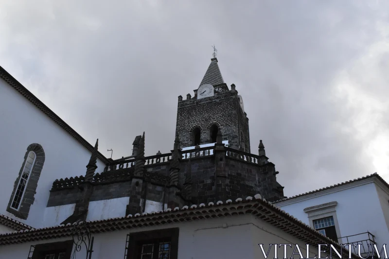 Madeiran Church Tower and Clouds Free Stock Photo