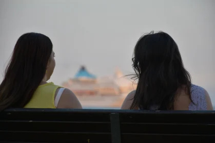 Women and Cruise Ship at Cyprus Seafront