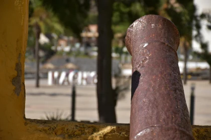 Antique Cannon in Urban Landscape