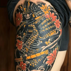 Japanese Samurai Tattoo Art with Sword and Flowers