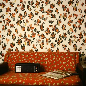 Retro Floral Wallpaper and Couch Scene