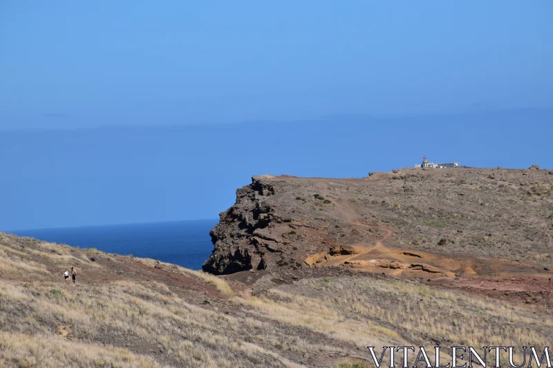 Madeira Coastline: Cliffs and Lighthouse Free Stock Photo