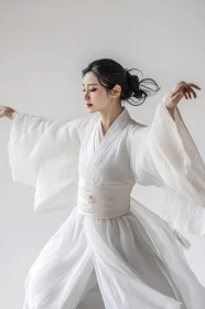 Elegant Woman in White Gown