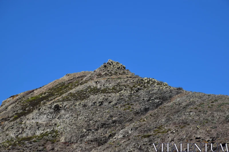 PHOTO Rugged Mountain Under Blue Sky