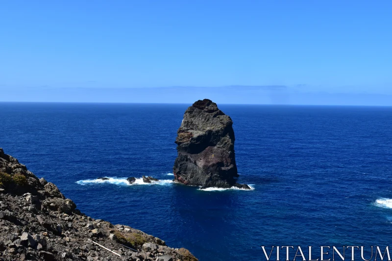 Solitary Rock in Blue Atlantic Free Stock Photo