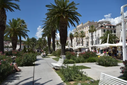 Bustling City Walkway in the Sun