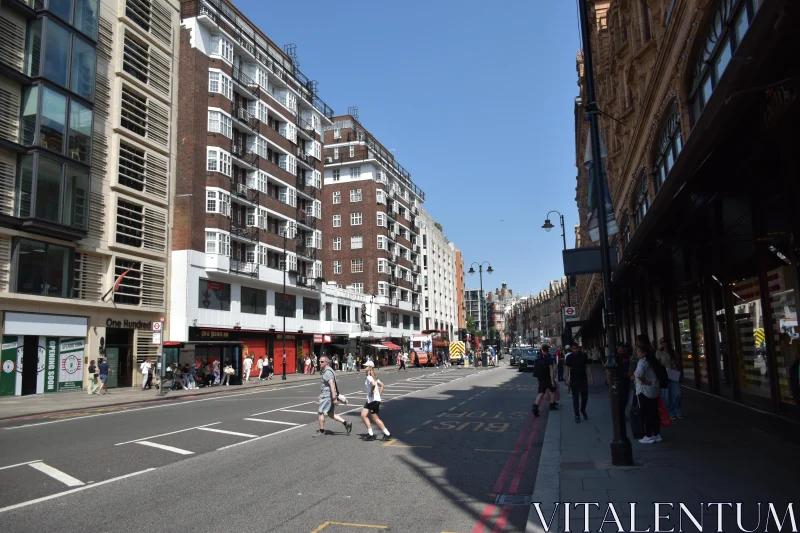 London Street with Pedestrians and Architecture Free Stock Photo