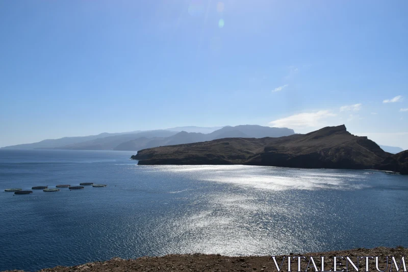 Sunlit Serenity at Madeira's Coastal Horizon Free Stock Photo