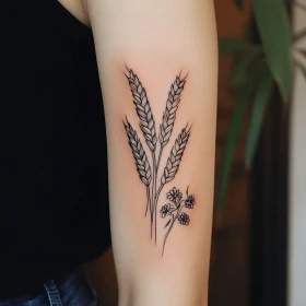 Black Ink Wheat and Wildflower Arm Tattoo