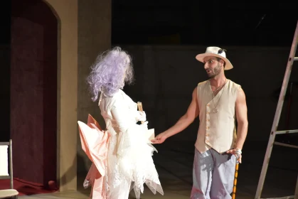 Stage Performance with Actors in Unique Costumes