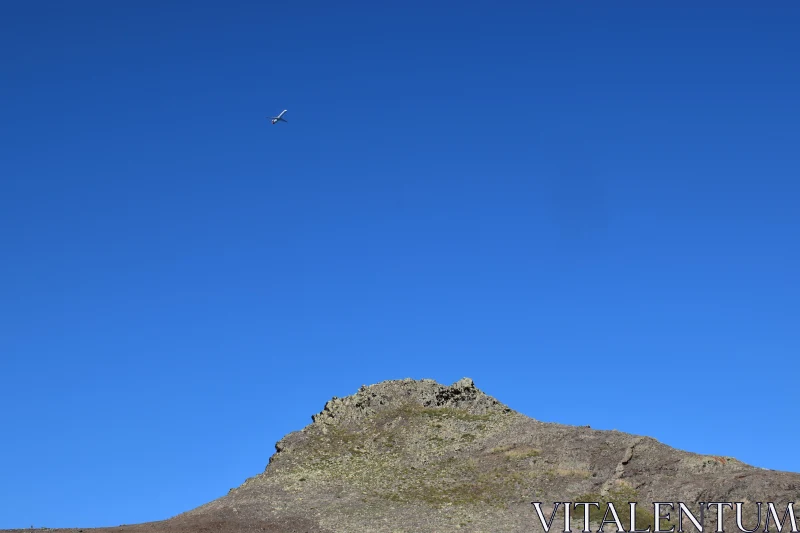 Isolated Peak and Airplane Free Stock Photo