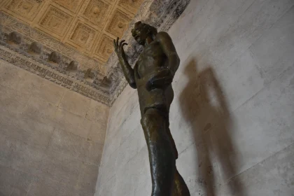 Bronze Figure with Architectural Shadow