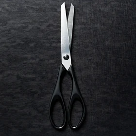 Sleek Scissors Art on Black Canvas