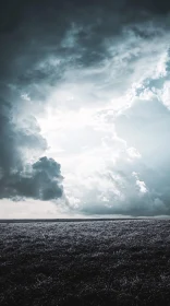 Field under a Stormy Sky