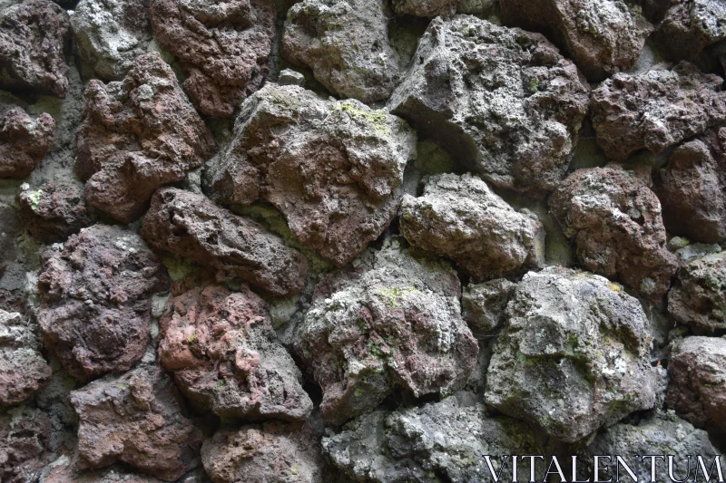 Close-Up of Textured Stone Wall Free Stock Photo