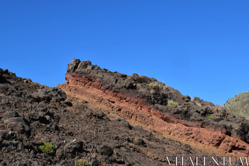 PHOTO Striking Geology with Red Oxidized Lava