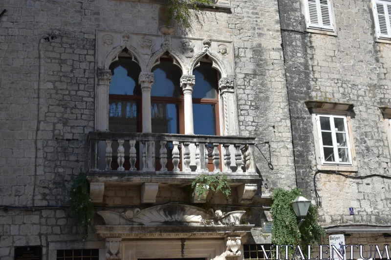 Medieval Stone Facade with Balcony Free Stock Photo