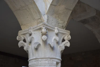 Historic Stone Column Capital with Detailed Carvings