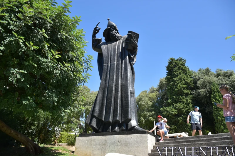 PHOTO Historic Bronze Monument Amidst Nature