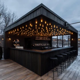 Elegant Outdoor Bar with String Lights