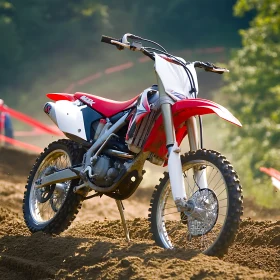 Red and White Motorcycle on Sand