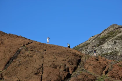 Hikers on a Red Mountain