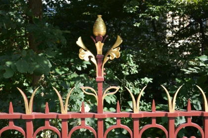 Decorative Ironwork Against Greenery