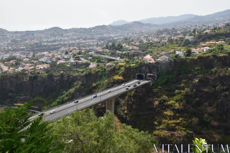 PHOTO Panoramic View of Madeira's Cliffside Bridge