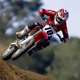 Action Shot of Motocross Rider Jumping