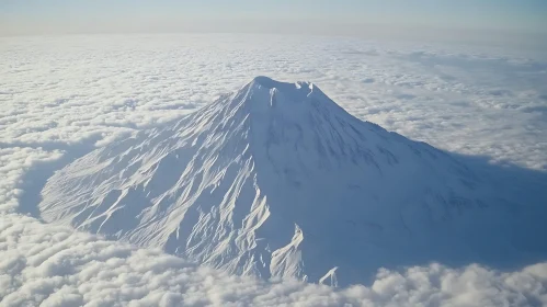 Mountain Peak in Winter Cloudscape