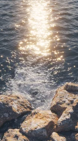 Sunlight Reflections on Ocean Waves and Rocks