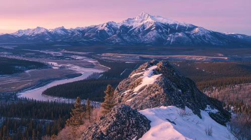 Majestic Snow-Covered Mountain Range in Sunset Light