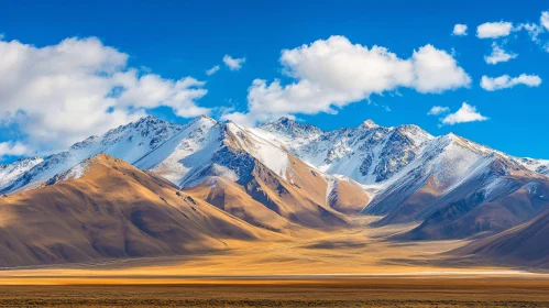 Snowy Peaks and Golden Fields