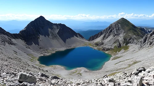 High-Altitude Lake Between Mountain Peaks