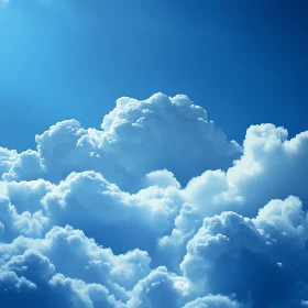 Billowing Clouds Under Blue Sky