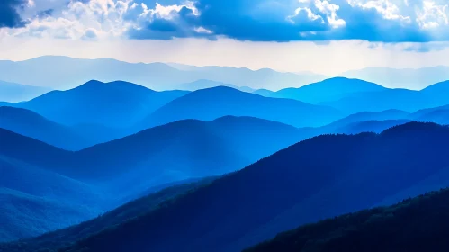 Layered Mountains in Blue Hues Scenery