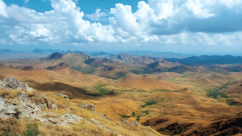 Mountainous Vista with Cloudy Sky