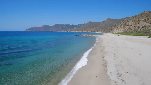 Coastal View of Beach and Mountains