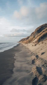 Coastal Tranquility: Sand Dunes and Ocean Waves