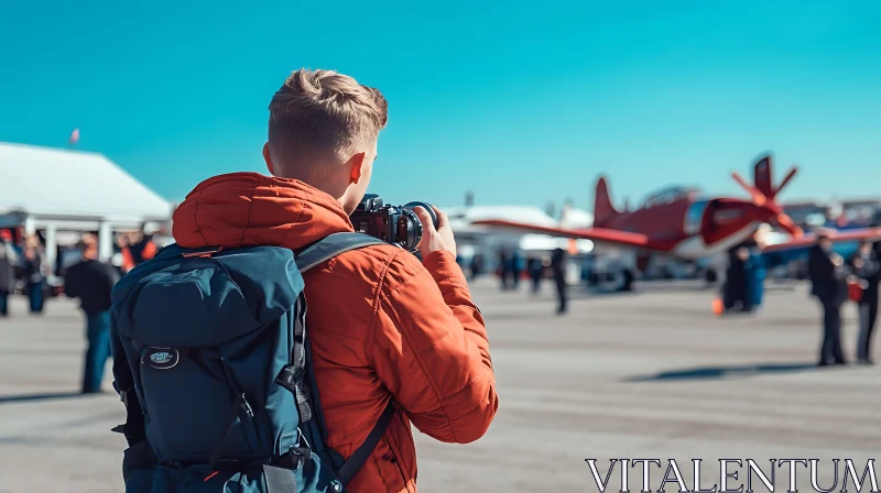 Young Photographer and Airplane