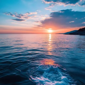 Tranquil Sunset Over Calm Ocean Waters