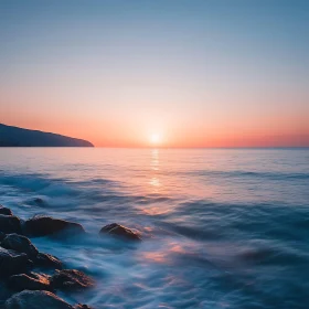 Sunset Over Calm Ocean Waters