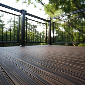 Wooden Deck with Black Railing View