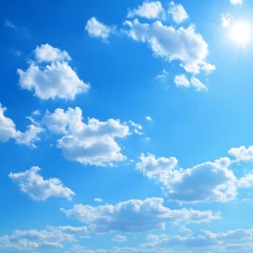 Fluffy Clouds in Azure Sky