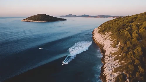 Ocean Surfing Near Rocky Coastline